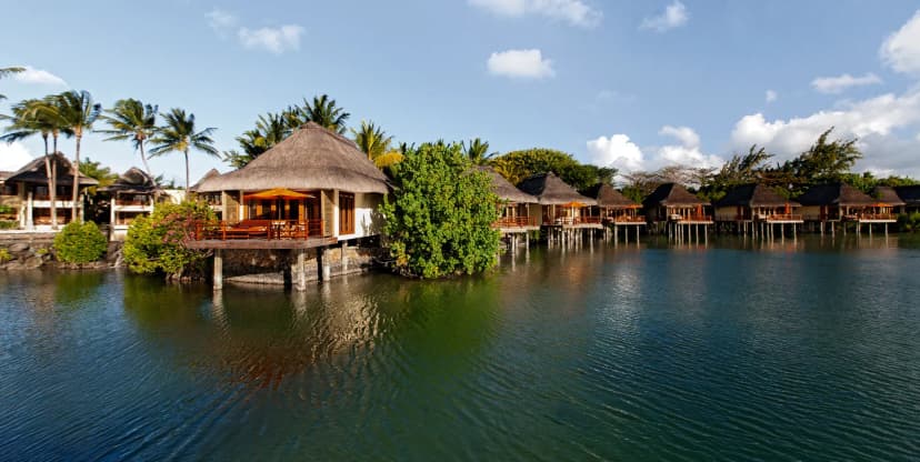 Sleep over the lagoon — the activity/scene in action. Suites on stilts above a protected fish reserve.