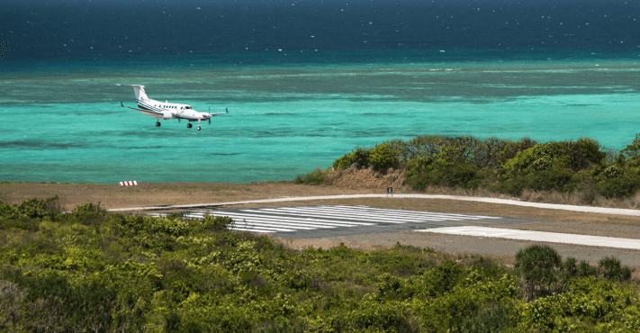 Private-charter arrival: To a private island and airstrip.