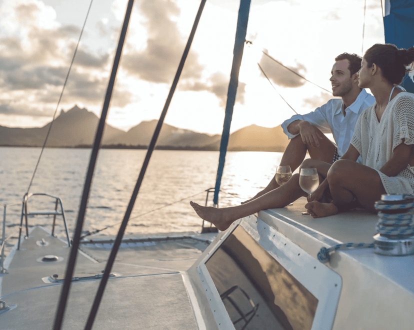 Boat to your own island — the activity/scene in action. A complimentary boat to guests-only Ilot Mangénie.