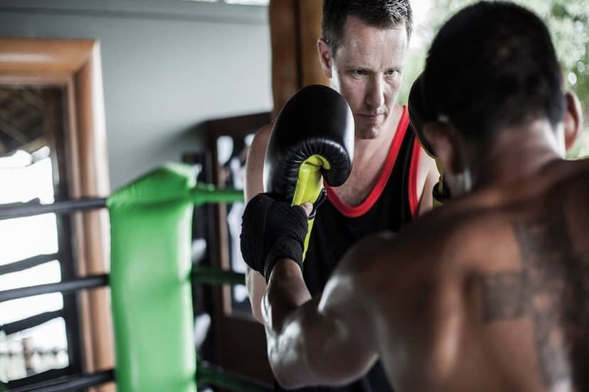 Muay Thai ring: Workouts with a trainer.