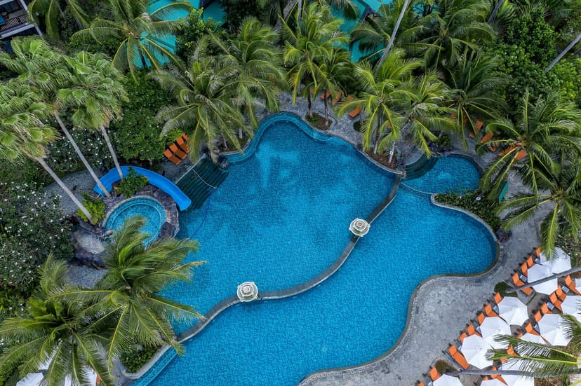 Two-tier waterfall pool: With a swim-up bar.
