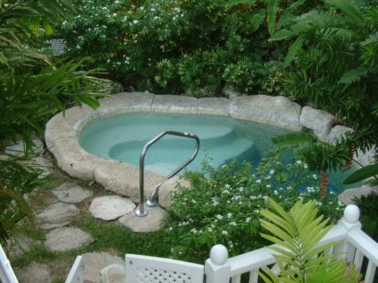 Plunge-pool cottages: Private pools among the gardens.