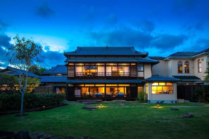 Hero/establishing shot of Hotel Utano Kyoto Besho, Kyoto, Japan. An intimate ten-room heritage hotel inside a restored early-Showa cultural-property mansion in north-west Kyoto, where the mountains meet the city.