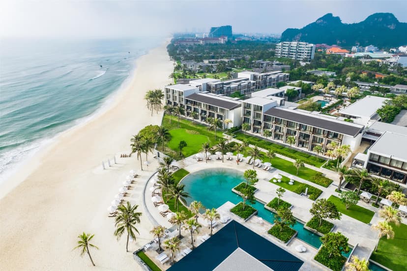 Hero/establishing shot of Hyatt Regency Danang Resort & Spa, Da Nang, Vietnam. A 49-acre family beach resort on Non Nuoc Beach, steps from the Marble Mountains and the best-placed gateway to three UNESCO sites — Hoi An, Hue and My Son.