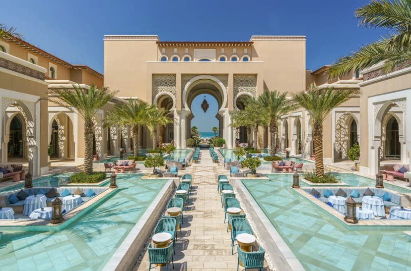 Hero/establishing shot of Rixos Premium Saadiyat Island, Abu Dhabi. An ultra-all-inclusive Ottoman-Mediterranean palace resort on Saadiyat Island’s protected hawksbill-turtle nesting beach, minutes from the Louvre Abu Dhabi.