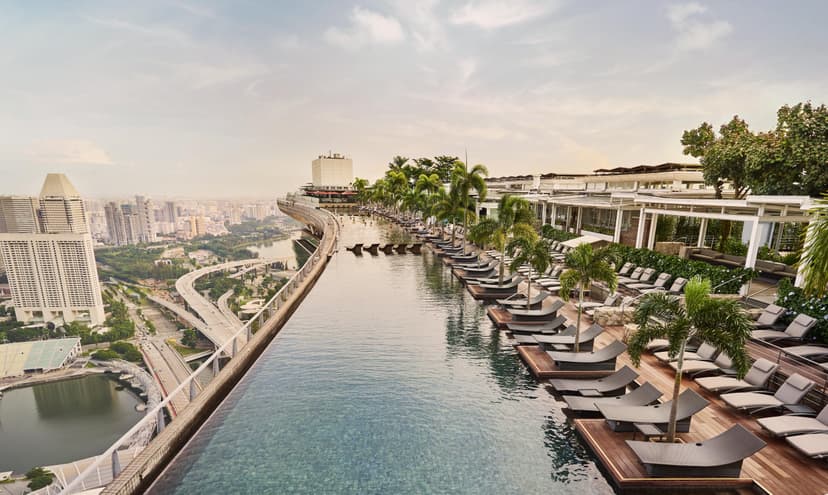 Hero/establishing shot of Marina Bay Sands, Singapore. Singapore’s mega-icon — the landmark three-tower integrated resort crowned by the Sands SkyPark, home to the world’s most famous elevated infinity pool, on the Marina Bay waterfront.