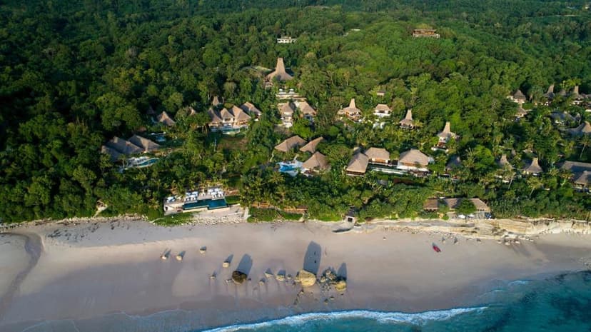Hero/establishing shot of Nihi Sumba, Sumba, Indonesia. A global-icon barefoot-luxe resort on the remote western coast of Sumba — No.