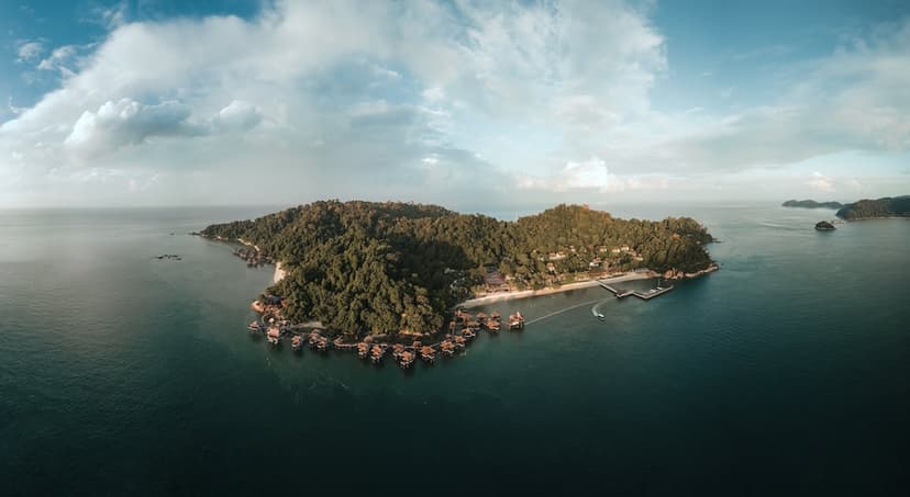 Hero/establishing shot of Pangkor Laut Resort, Pangkor Laut, Malaysia. A privately owned 300-acre rainforest island in the Straits of Malacca — once voted No.