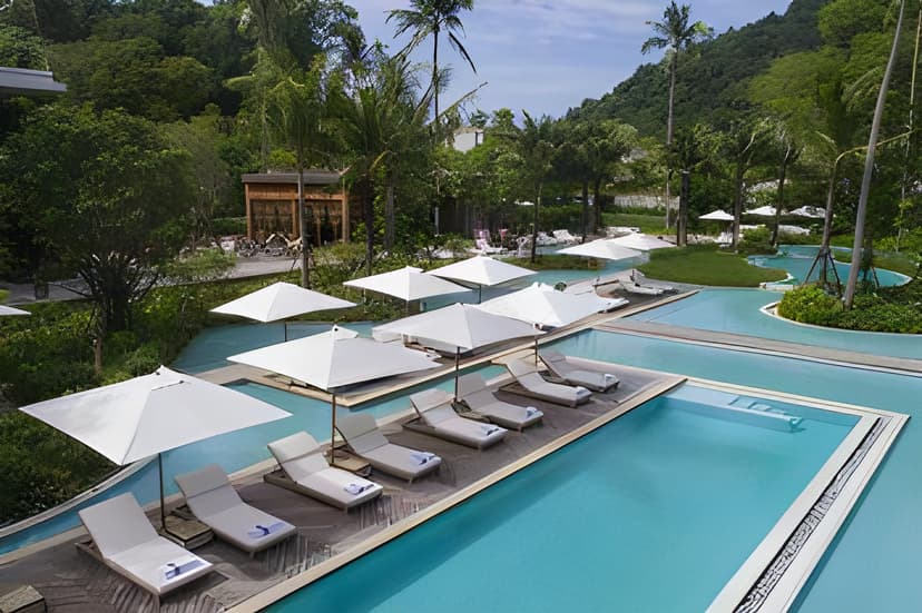 Hero/establishing shot of Rosewood Phuket, Phuket, Thailand. Southeast Asia’s first Rosewood — an all-villa beach resort on a forested hillside above a 600-metre private beach at Emerald Bay, one of Phuket’s last secluded enclaves.