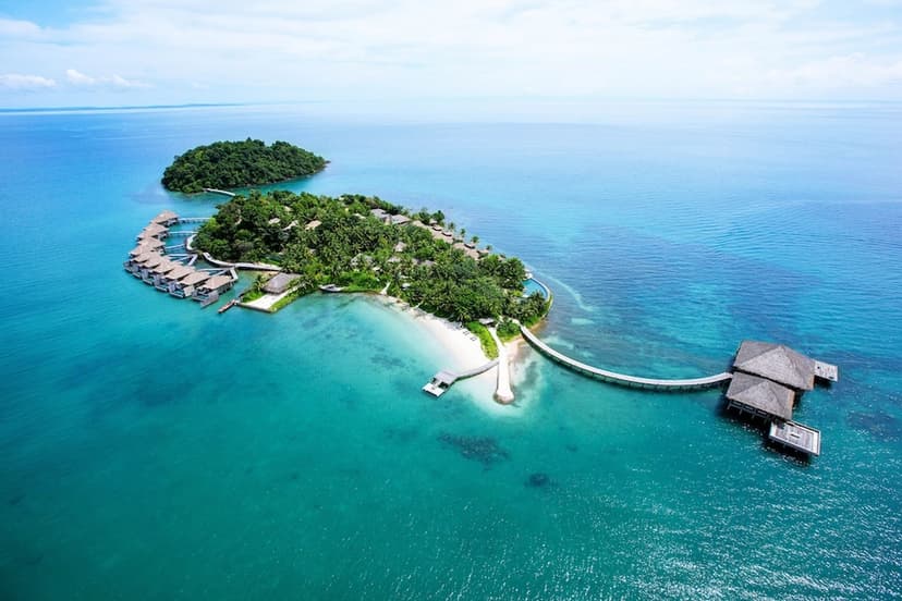 Hero/establishing shot of Song Saa Private Island, Koh Rong, Cambodia. Cambodia’s first luxury private island and its only over-water villas — two islands in the Koh Rong Archipelago linked by a footbridge over Cambodia’s first marine reser