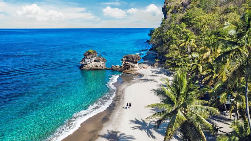 Hero/establishing shot of Anse Chastanet, St Lucia. The original St Lucia luxury resort, an eco-immersed estate above two soft-sand beaches in a marine reserve — home to some of the Windwards' best beach diving.