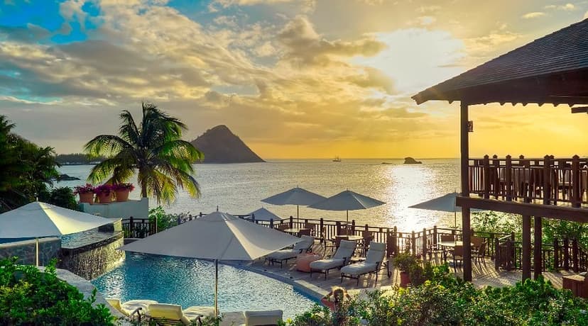 Hero/establishing shot of Cap Maison, St Lucia. The first Relais & Châteaux in St Lucia, a clifftop Spanish-Caribbean boutique on the quieter north coast above secluded Smuggler's Cove.
