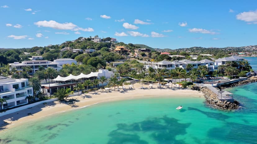 Hero/establishing shot of Hodges Bay Resort & Spa, Antigua. A contemporary north-coast boutique resort, the closest of the set to the airport, with Katsuya's first Caribbean location and the fine-dining NaCl.