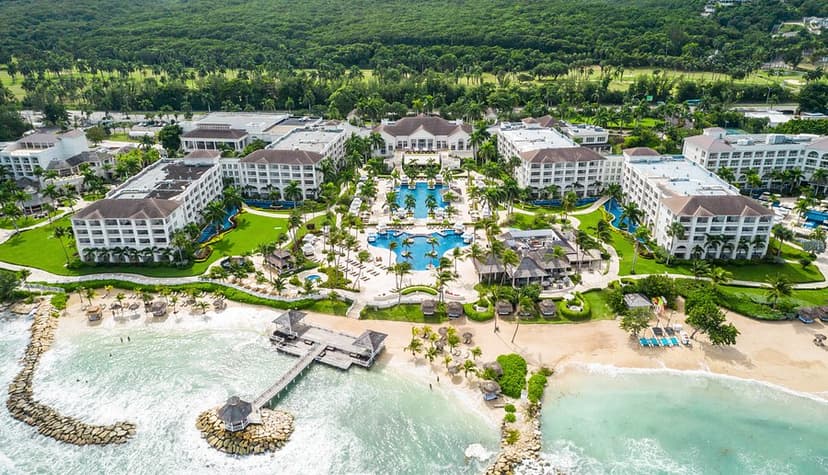 Hero/establishing shot of Hyatt Ziva Rose Hall, Montego Bay, Jamaica. A big-brand all-inclusive on a private Rose Hall beachfront, the closest of the set to Montego Bay airport.