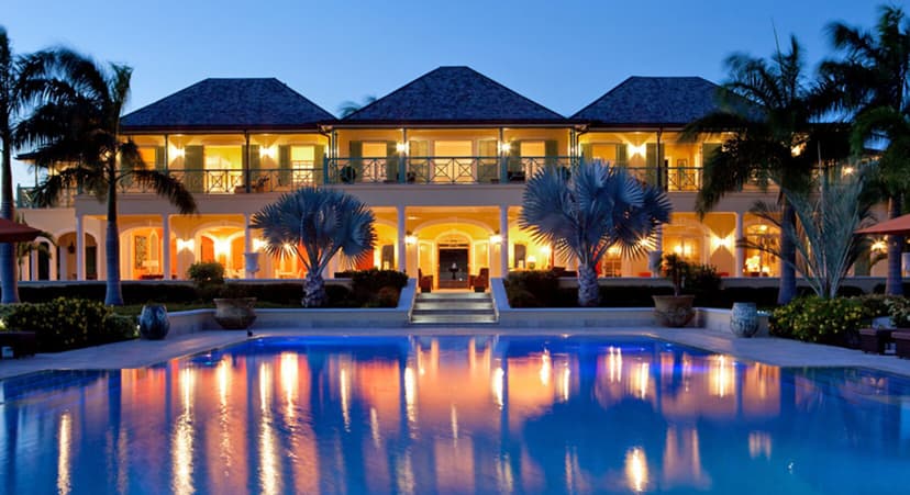 Hero/establishing shot of Jumby Bay Island, Antigua. An Oetker Collection private island, three hundred acres a short boat ride off north-east Antigua, reached only by water.