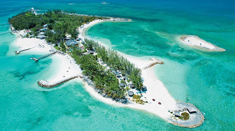 Hero/establishing shot of Sandals Royal Bahamian, Nassau, Bahamas. An adults-only all-inclusive on Cable Beach with a private offshore island, Barefoot Cay, reached by a short boat.
