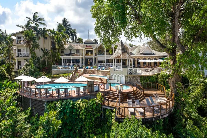 Hero/establishing shot of Sandals Royal Plantation, Ocho Rios, Jamaica. An intimate seventy-four-suite, all-oceanfront, all-butler, adults-only retreat on two private coves above Ocho Rios.