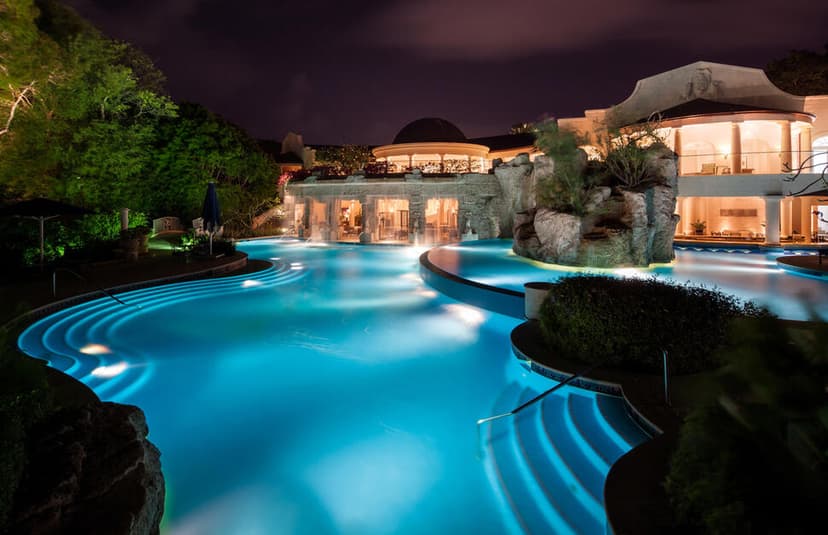 Hero/establishing shot of Sandy Lane, St James, Barbados. Barbados' icon on the Platinum Coast, set in a mahogany grove above a thousand feet of crescent beach.