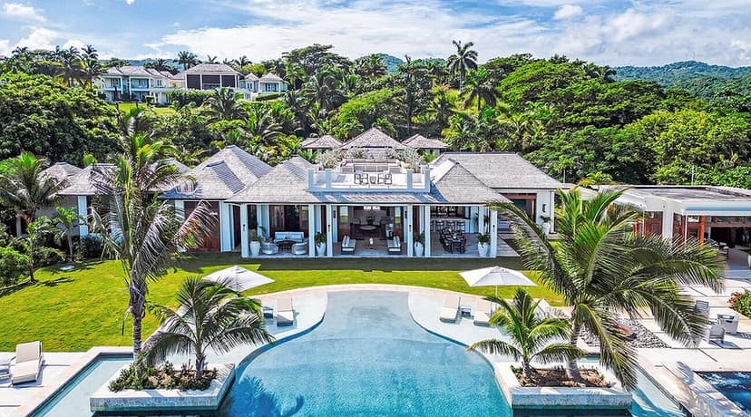 Hero/establishing shot of The Tryall Club, Hanover, Jamaica. A 2,200-acre former-plantation estate west of Montego Bay with a world-renowned coastal championship golf course and a private mile of beach.