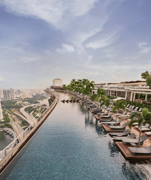 SkyPark infinity pool: A sunset swim over the skyline.