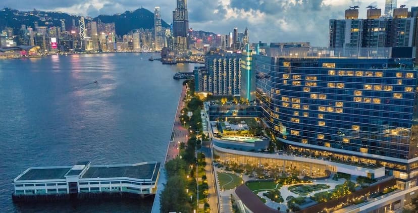 Hero/establishing shot of Kerry Hotel Hong Kong (by Shangri-La), Hong Kong. Hong Kong’s first urban lifestyle resort — a Shangri-La-group, André Fu-designed waterfront hotel at Hung Hom Bay with a rare harbourfront garden and outdoor pool.