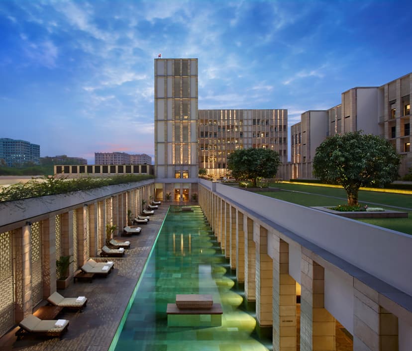 Hero/establishing shot of The Lodhi, New Delhi, India. A Kerry Hill-designed contemporary sanctuary on seven acres by Lodi Gardens in central Delhi — a calm, design-led retreat-in-the-city and a Leading Hotels of the World member.