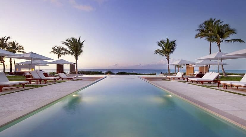 Hero/establishing shot of Grace Bay Club, Providenciales, Turks & Caicos. The original Turks & Caicos luxury resort, with the largest frontage on the world's number-one beach.