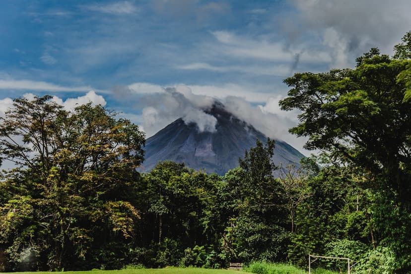 The near-perfect cone of Arenal above the rainforest