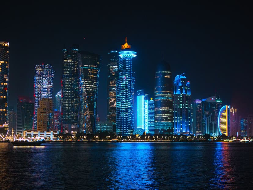 A seven-kilometre waterfront promenade curving below the West Bay skyline