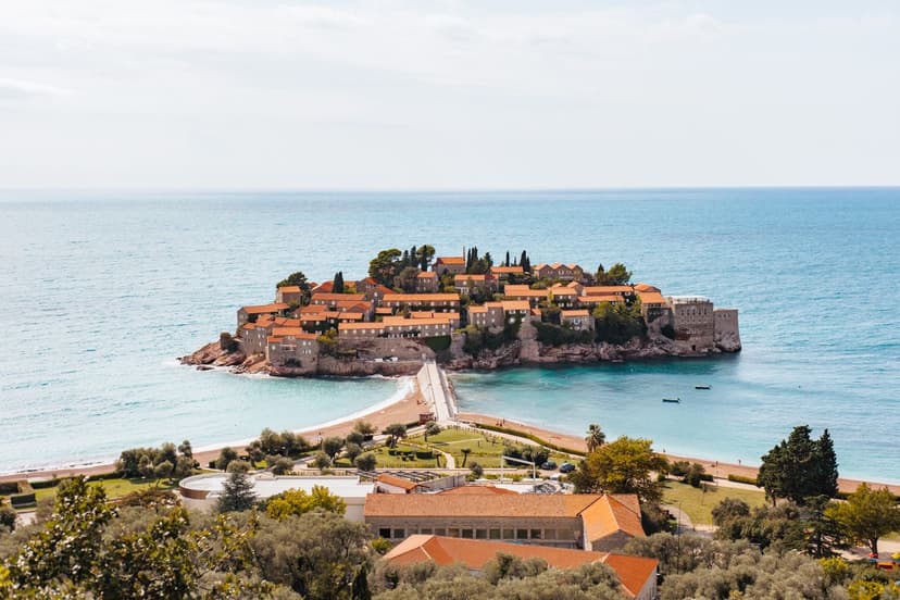 The iconic fortified islet, once a fishing village and now a legendary resort — the postcard image of the Montenegrin coast.